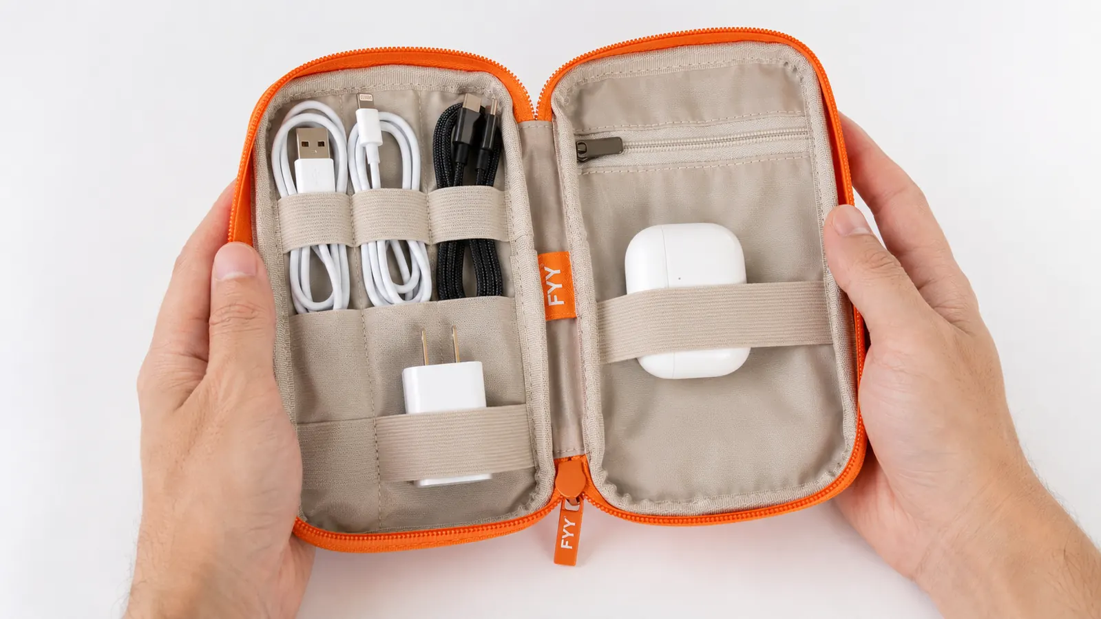 FYY travel cable organizer pouch open showing organized cables, adapters, and earbuds in elastic loops